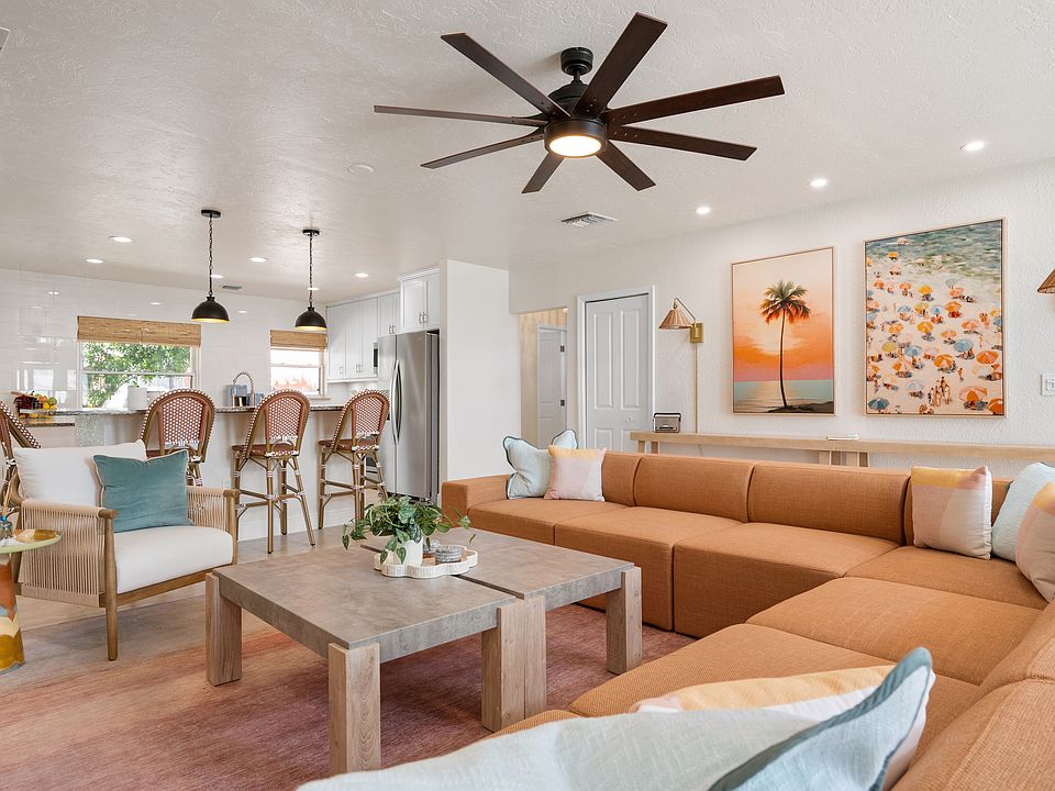 Gather the whole crew in the beautiful, bright, and open living room, featuring a brand-new, oversized sectional big enough for the whole family to pile onto after a day in the sun!