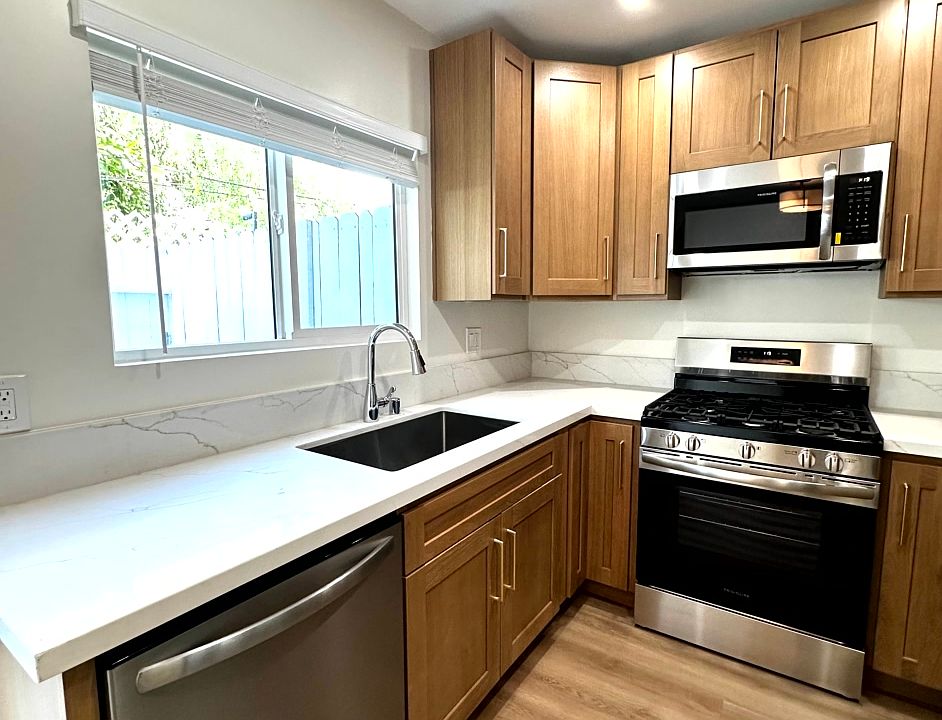 Brand new kitchen with high end cabnietry and all new appliances including dishwasher and high end fridge.