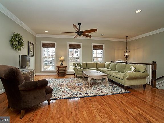 Spacious living room with hardwood flooring