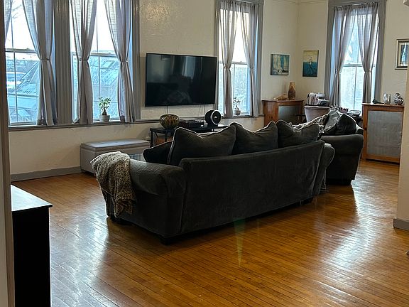 Sunny living room with river views