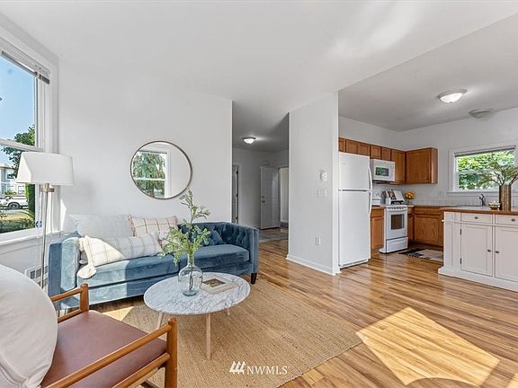 Unit A is vacant and staged! Ready to rent with newer laminate wood floors, windows, & fresh paint. 