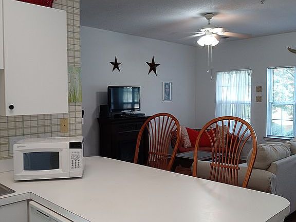 VIEW FROM KITCHEN OF LIV.RM.