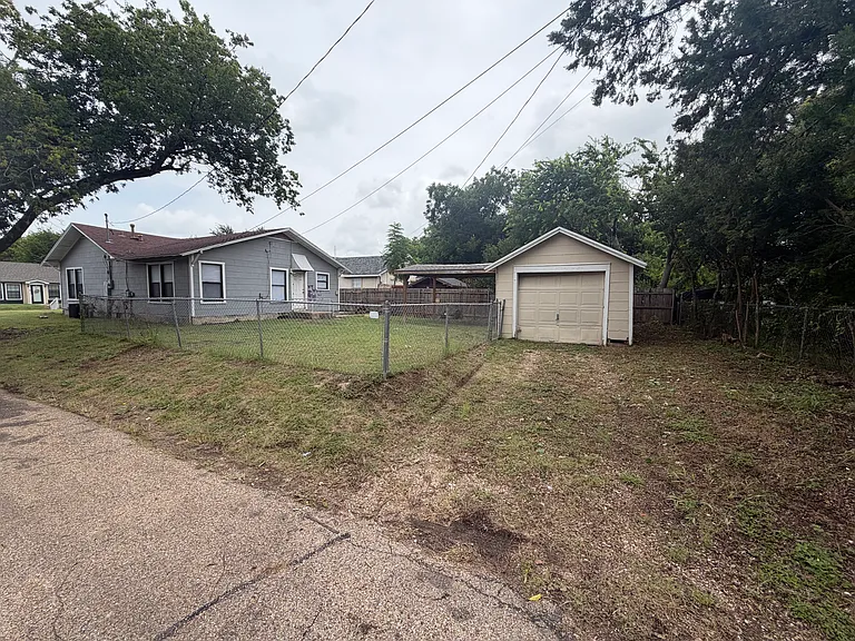 Back - Includes the detached garage - and more parking