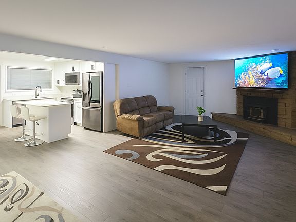 AI generated visualization of open living room/kitchen