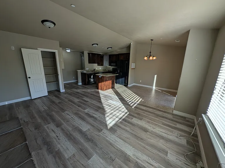 Great room facing the kitchen and dining room