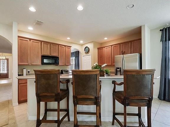 Island kitchen with breakfast bar
