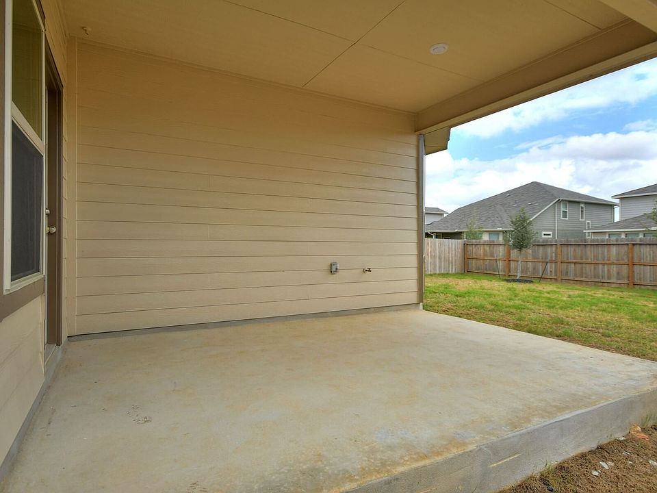 Back exterior of the San Saba floorplan at a Meritage Homes community.