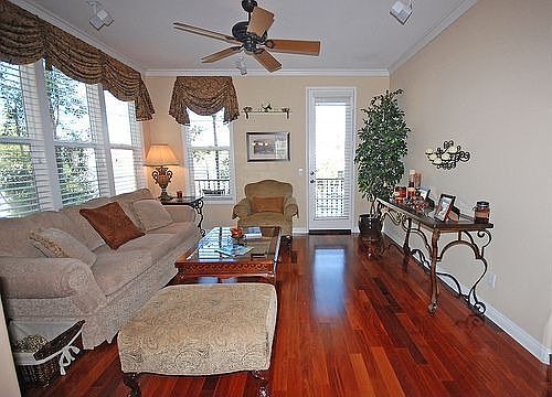 Rich hardwood and custom paint showcase this home's designer style!