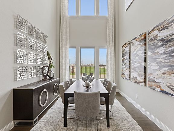 Dining room in the Glacier home plan by Trophy Signature Homes - REPRESENTATIVE PHOTO
