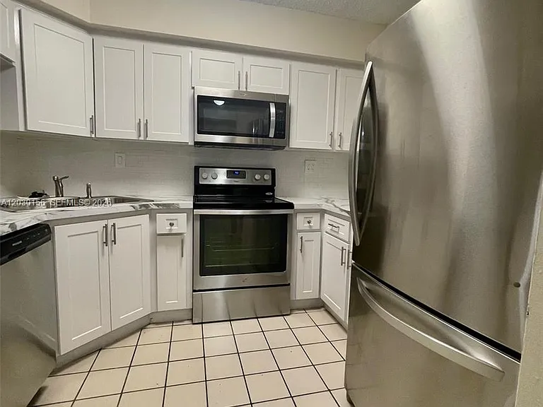 5825 W 25th Ct #311 — Photo 15