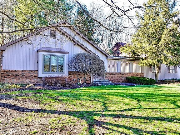 Irrigation system, mature trees, and beautiful landscaping