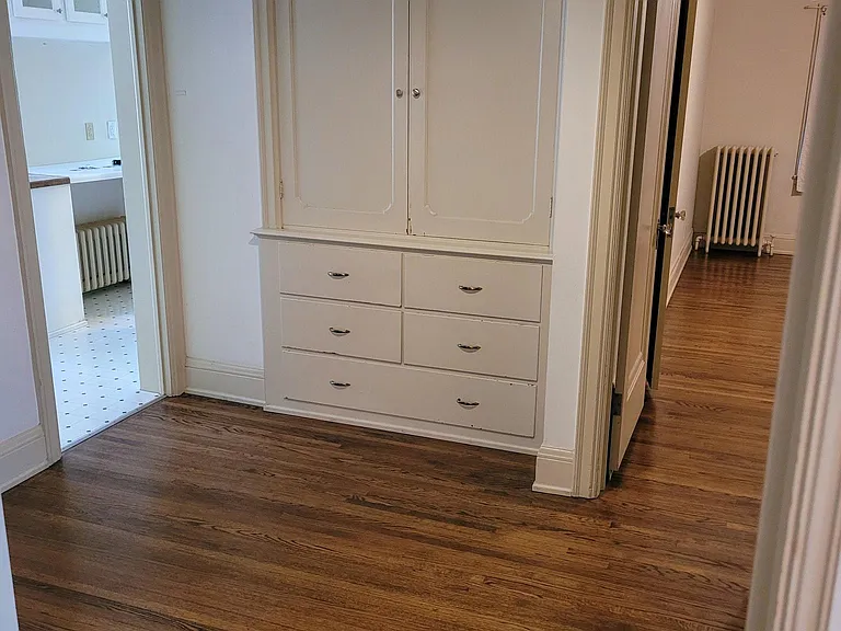 Hallway and storage between rooms