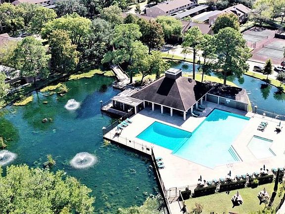 Lake, pool area, club house and tennis courts.