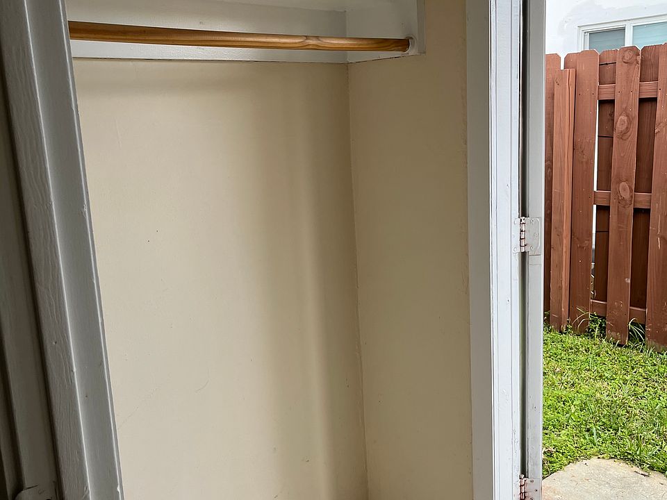 Walk-in closet and second entrance to Fenced back yard
