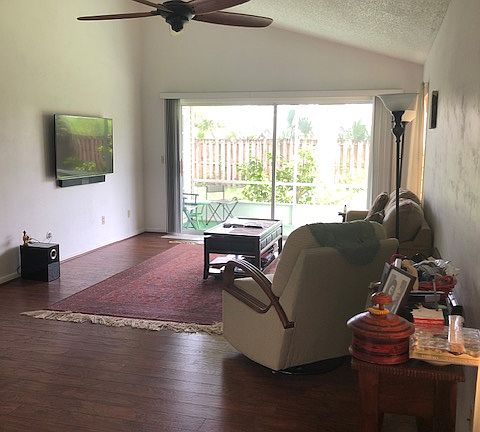 Living room with a pull-out comfortable king-size bed which in a pinch can serve as a third sleeping arrangement.
