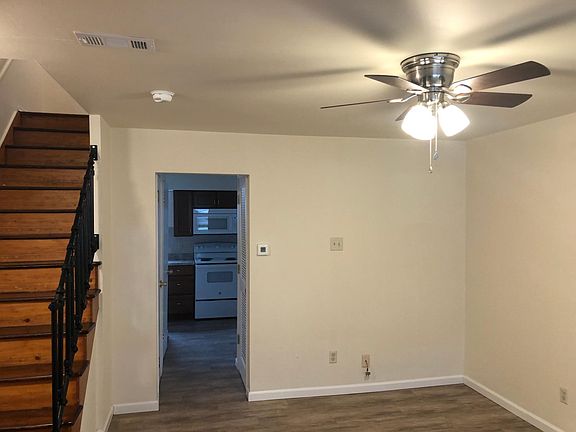 Living room looking into the kitchen area.