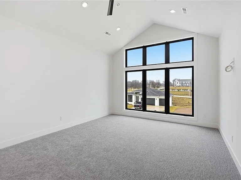 large upstairs bed with walk in and private full bath