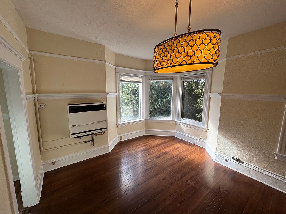 Gas heat, bay windows facing West