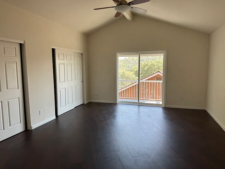 large master bedroom with walkout balcony