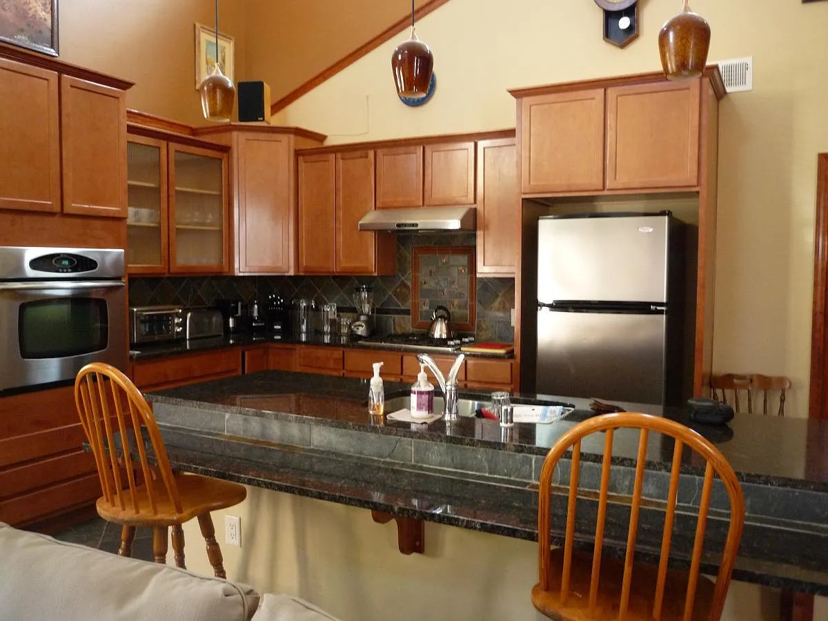 Chef's Kitchen with bar seating. - Carson Rd NW