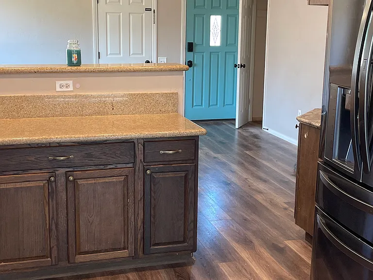 Kitchen facing fron door