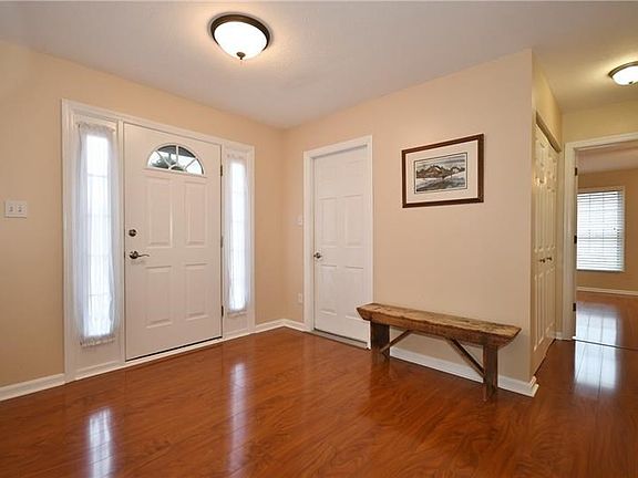 The gleaming hardwoods add to the bright, clean feel of this home, while the open layout creates ease of movement and an airy, o