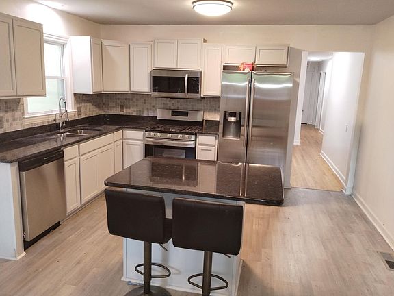 Renovated Kitchen and Island, with new appliances.