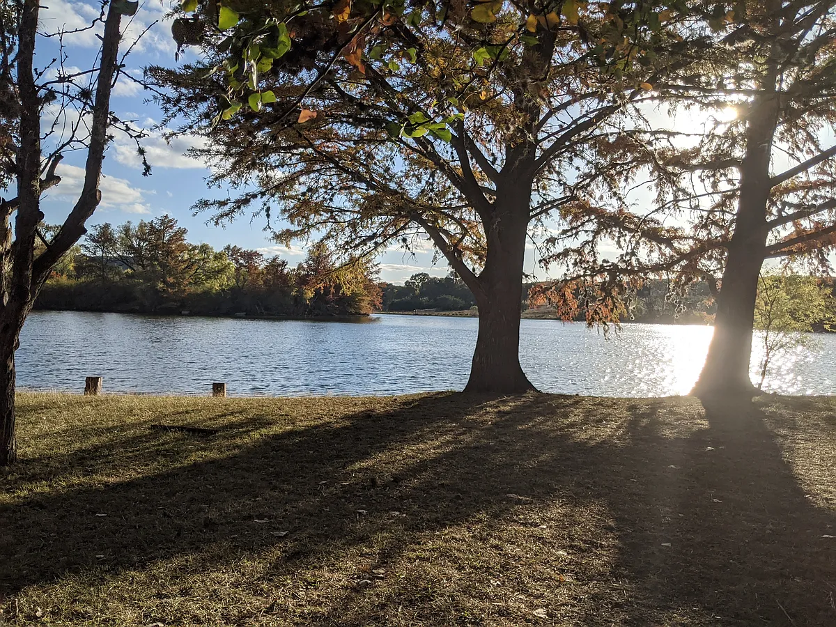 Enjoy the shade of the Cypress trees while you fish , or kayak at the15 acre, private, spring fed lake - 235 Pecan Valley Rd
