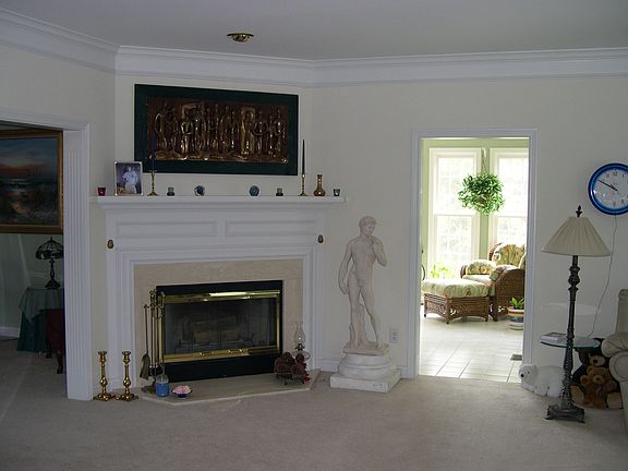 Family Room with wood burning/gas sterter fire place