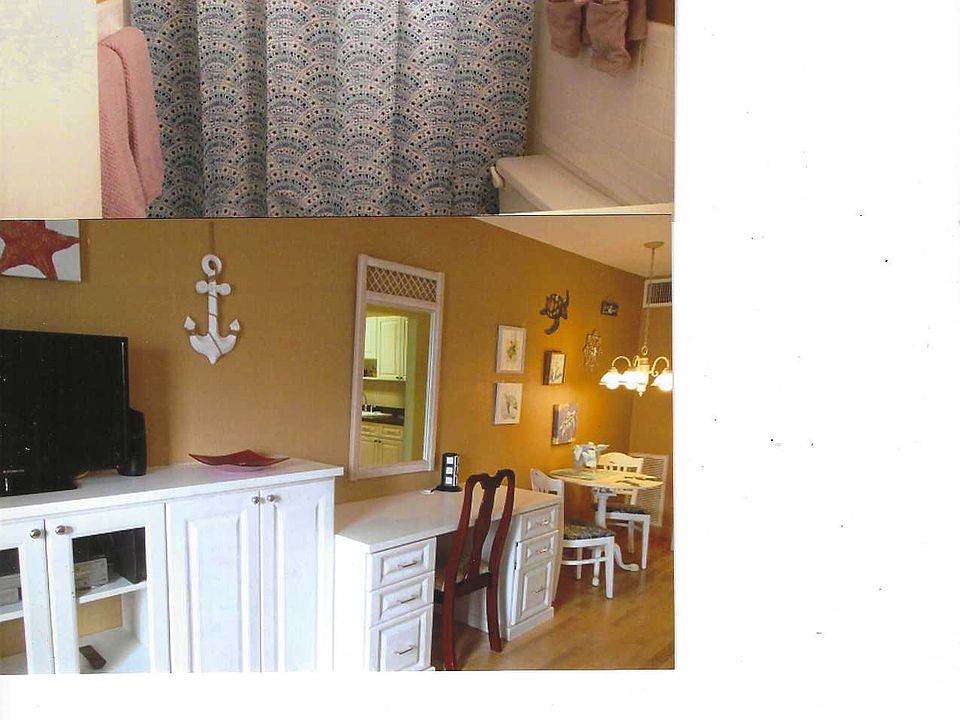 Bathroom with shower;
Built in desk & cabintry.
2 TV - Cable & Wifi