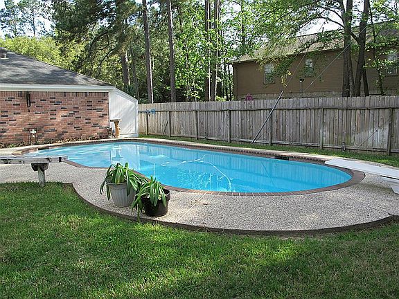 Backyard retreat with sparkling pool.
