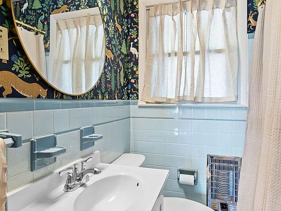 Full Bathroom. Linen Closet in Bathroom.