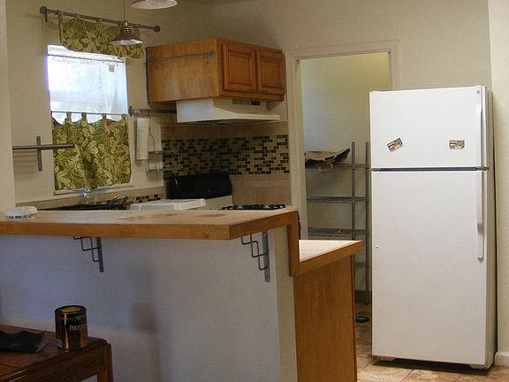 Has walk in pantry with washer and dryer hookup.