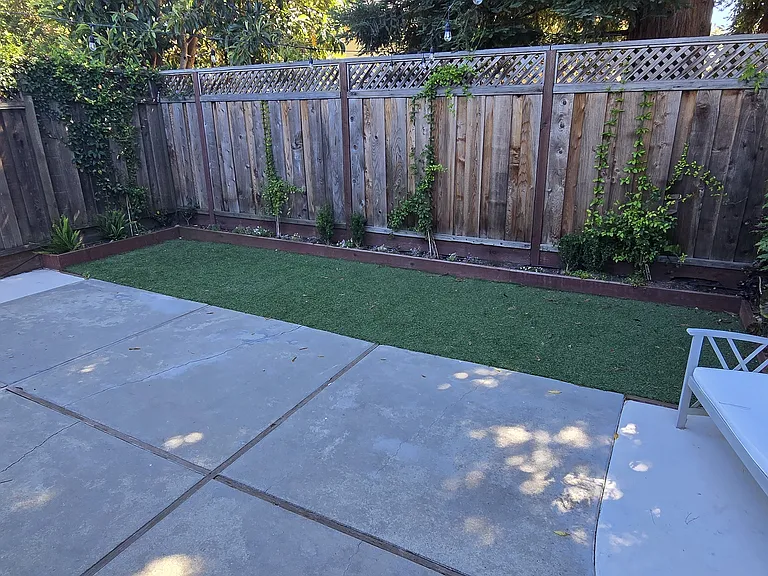 Gardening boarders and automatic watering already set up.
