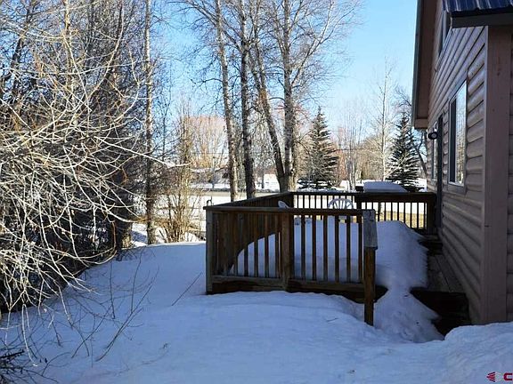 Overlooks the pond, corner unit, shade with grassy lawns.