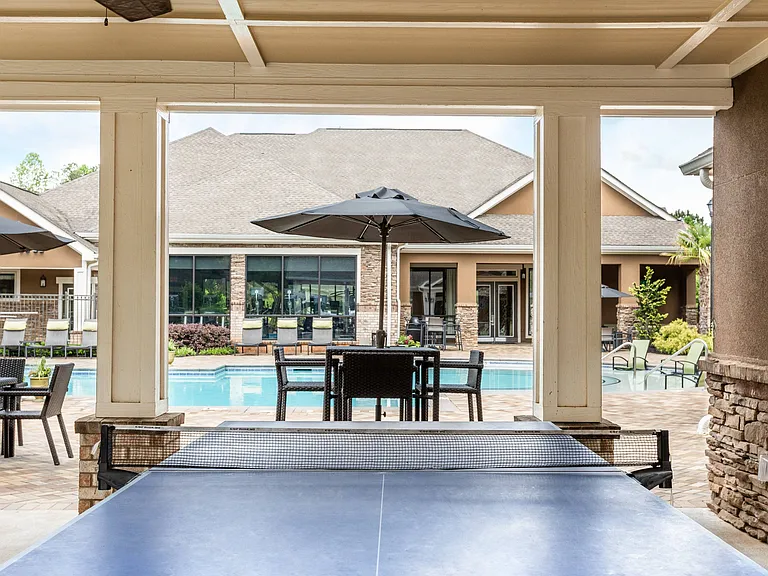 Poolside Game Area with Ping-Pong Table