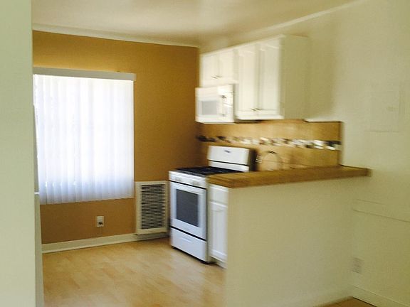 Good size full kitchen, living room with hardwood.