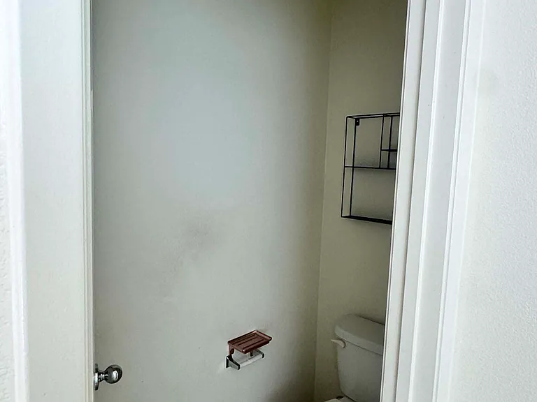 Separated ventilated master bathroom