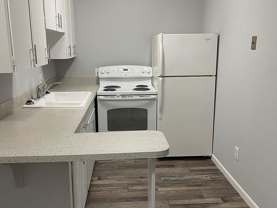 Kitchen with refrigerator and stove