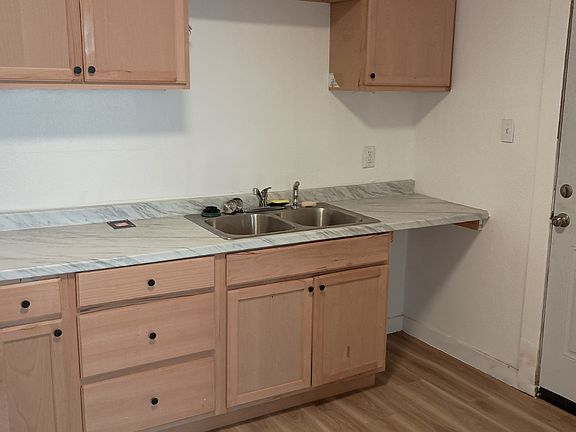 Kitchen with new cabinets and countertop. New dishwasher to come week of July 4th.