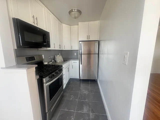 Building Photo - 8635 21st Ave #6G