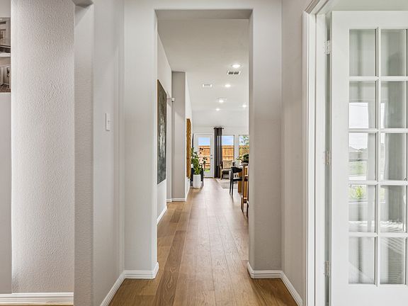 Entryway in the Turquoise home plan by Trophy Signature Homes - REPRESENTATIVE PHOTO