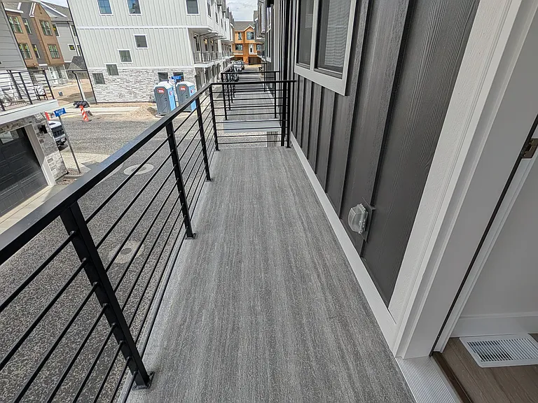 Patio just off of the kitchen overlooking the alley way