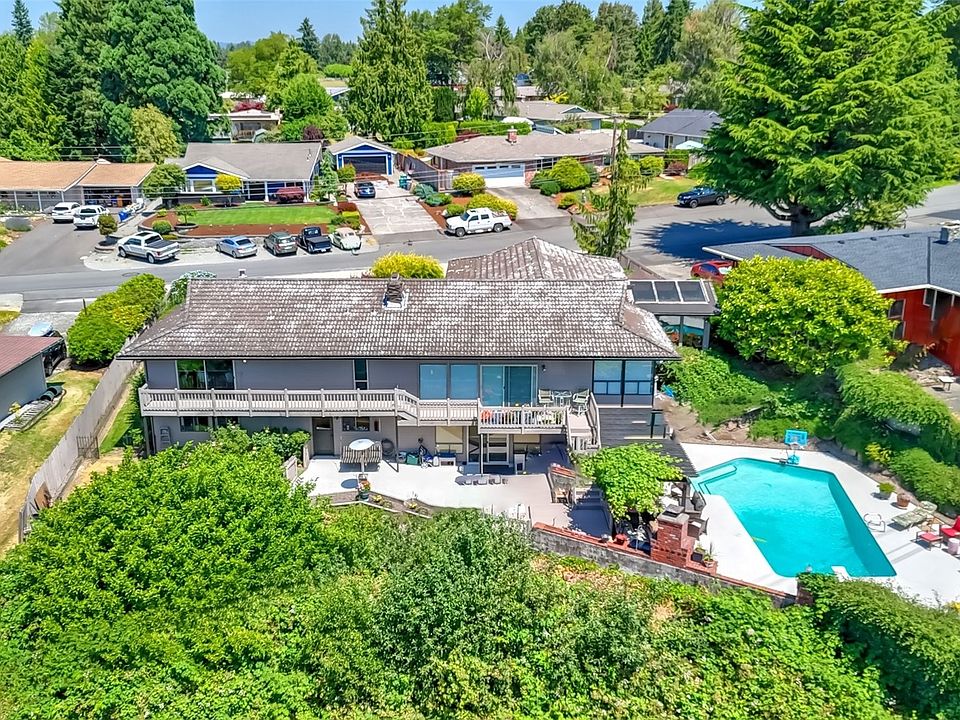Spacious basement rambler w/charm throughout & an exceptional backyard retreat. What a great space to make memories in!>