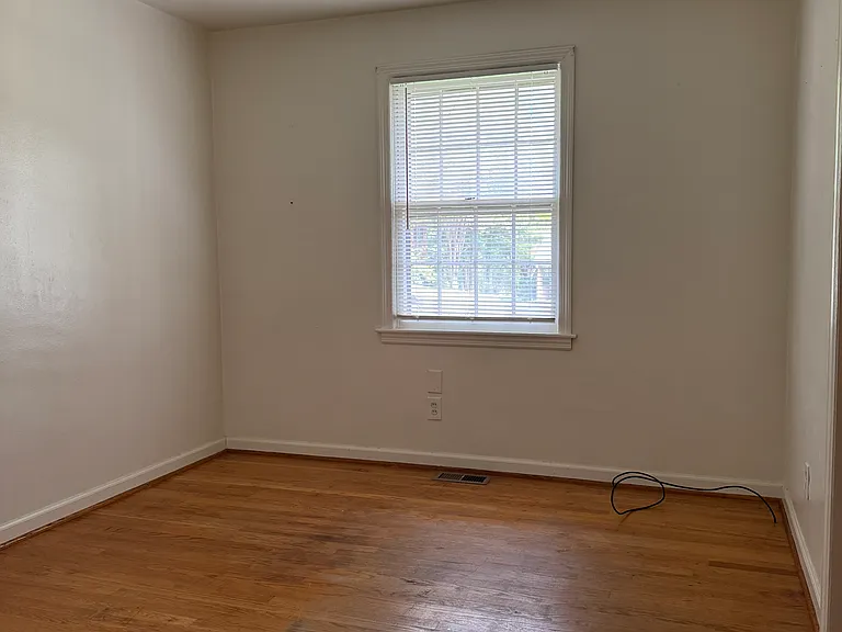 Bedroom #2. One window and nice closet with two sliding doors.