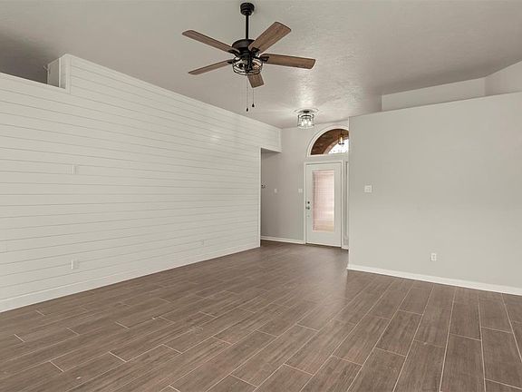Family room with shiplap walls. Cable ready!