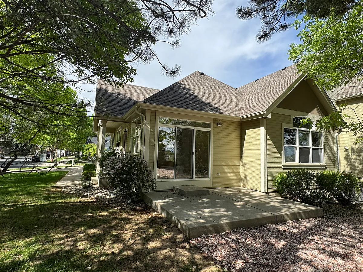 Enjoy the view of the private patio and master bedroom window overlooking a serene, open backyard. This peaceful outdoor space offers beautiful scenery and complete privacy-all with no maintenance required. - 616 Wild Ridge Cir