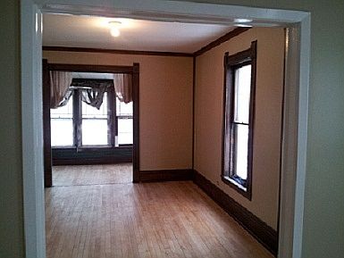 Inviting Living Room, 17x8ft Front Porch, also a Rear Porch with Skyline View and CozySeatingForTwo