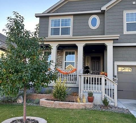 Perfect porch for relaxing and enjoying the peaceful neighborhood.