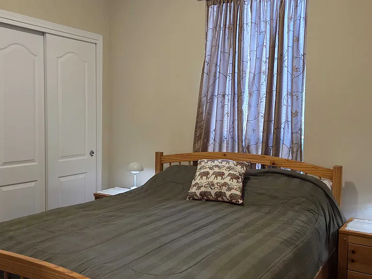 Quality comfortable queen mattress with two matching full sized closets.